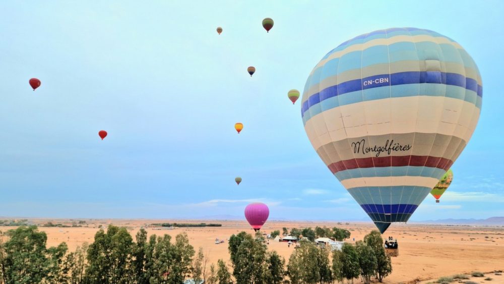 Discover the beauty of Marrakech from above with our hot air balloon tour. Includes flight details, breakfast, and breathtaking views of the Atlas Mountains.