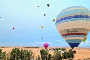 Discover the beauty of Marrakech from above with our hot air balloon tour. Includes flight details, breakfast, and breathtaking views of the Atlas Mountains.